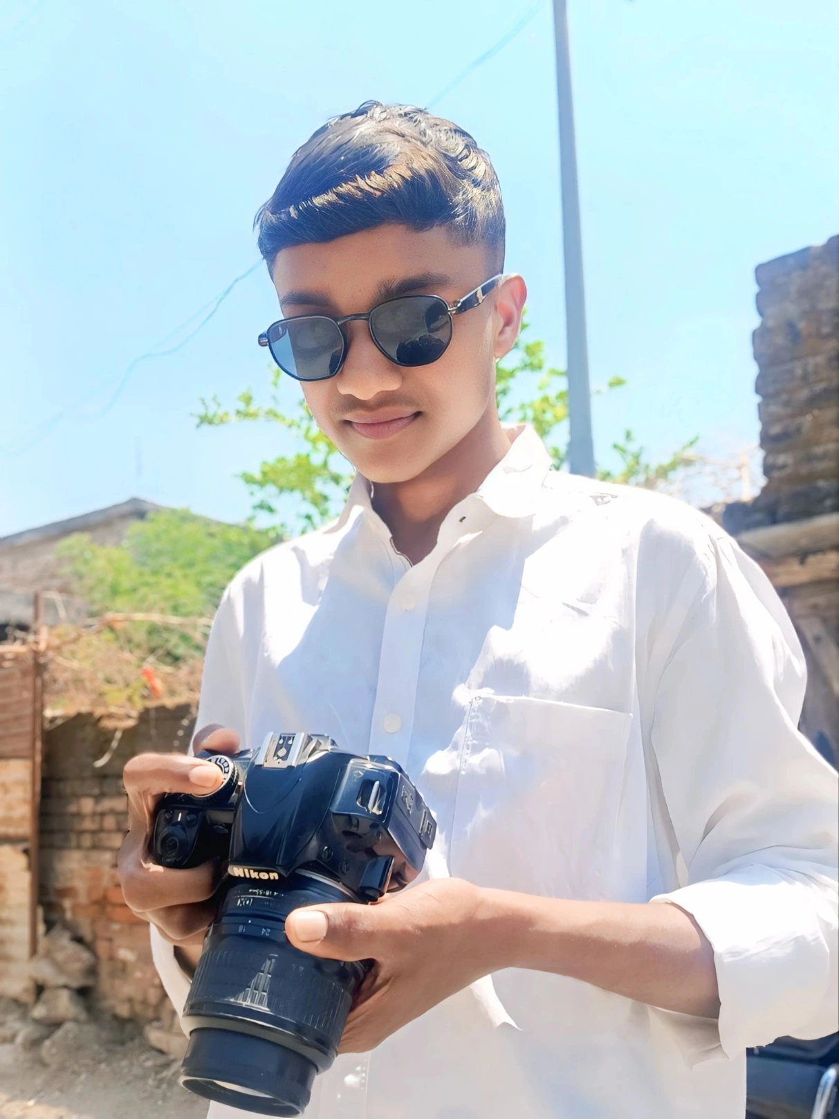 RAVINDRA DHOKE