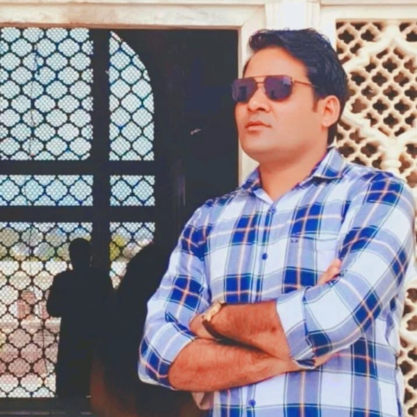 S. KHAN